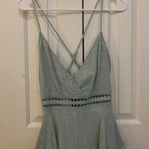 Saints and Secrets teal romper